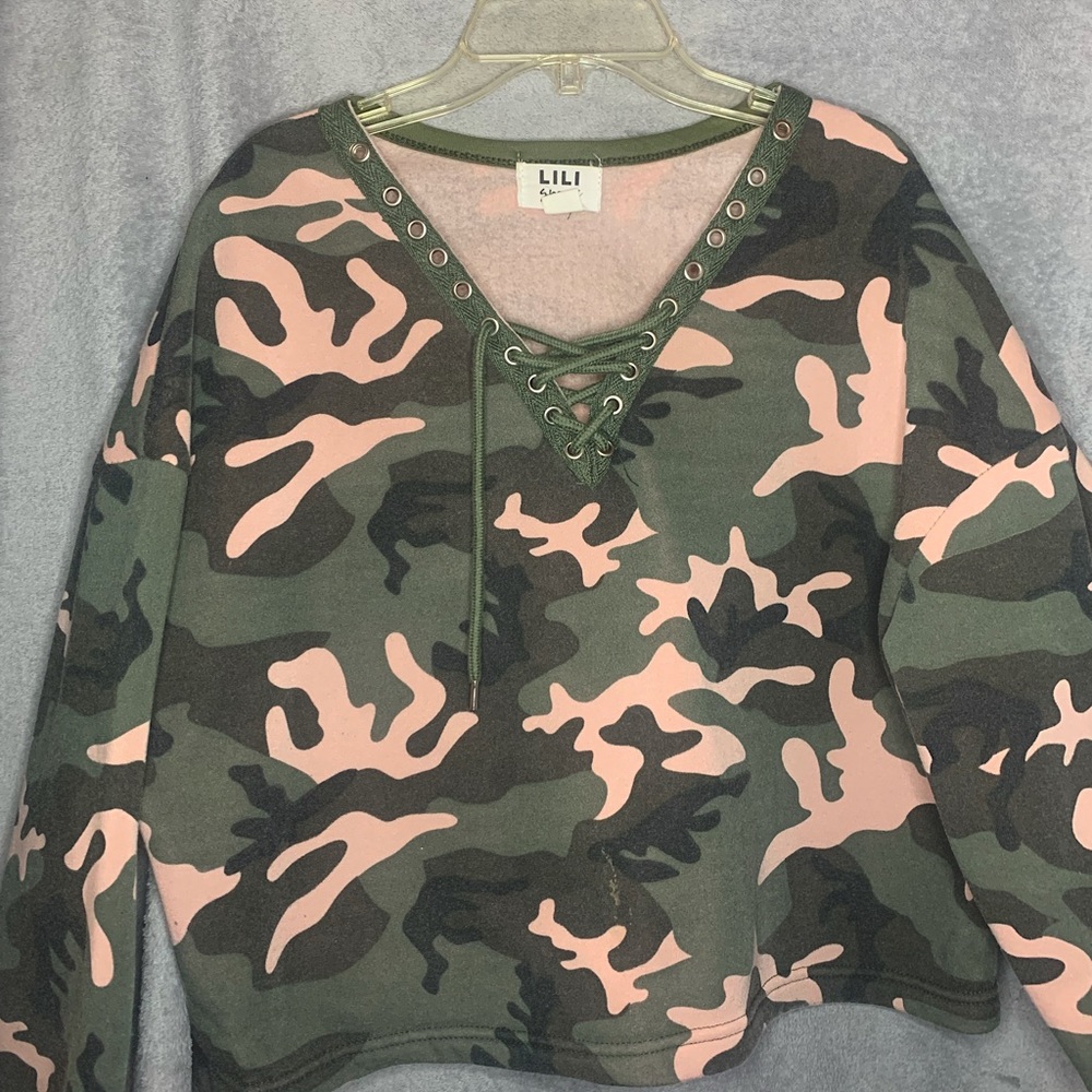 pink and green camo sweater/shirt like with strings